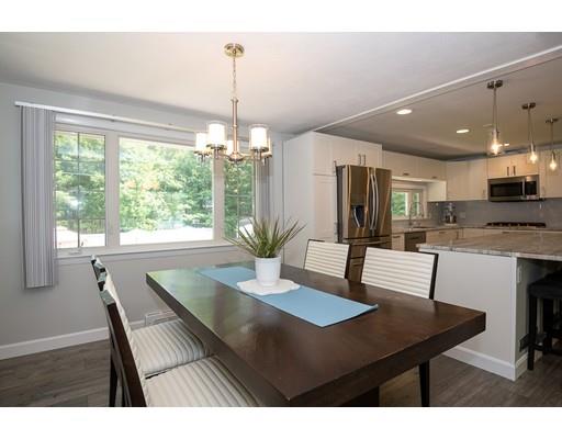 18 Austin Road Sudbury, MA 01776 - Photo 11 of 38 a view of a dining room with furniture window and wooden floor
