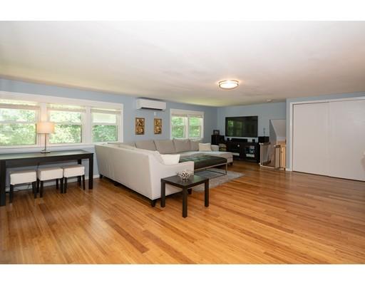 18 Austin Road Sudbury, MA 01776 - Photo 14 of 38 a living room with furniture and a wooden floor