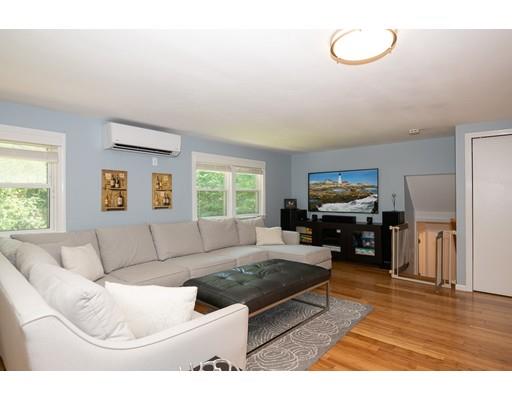 18 Austin Road Sudbury, MA 01776 - Photo 15 of 38 a living room with furniture window and a flat screen tv