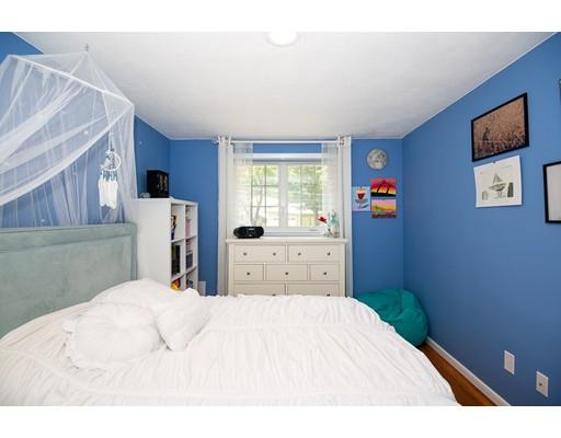 18 Austin Road Sudbury, MA 01776 - Photo 18 of 38 a bedroom with a bed and a window