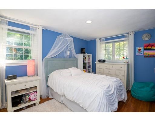 18 Austin Road Sudbury, MA 01776 - Photo 19 of 38 a bedroom with a bed a window and dresser