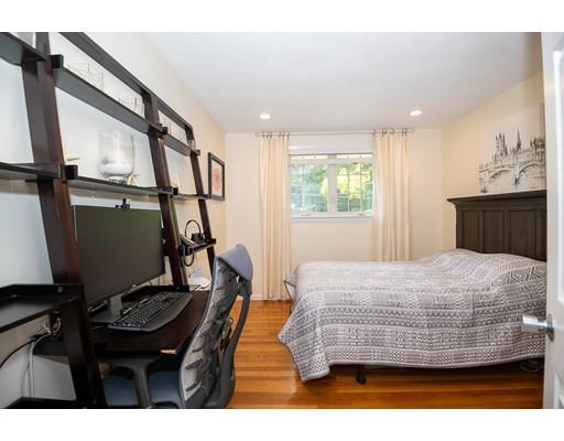 18 Austin Road Sudbury, MA 01776 - Photo 22 of 38 a bedroom with a bed and a dresser