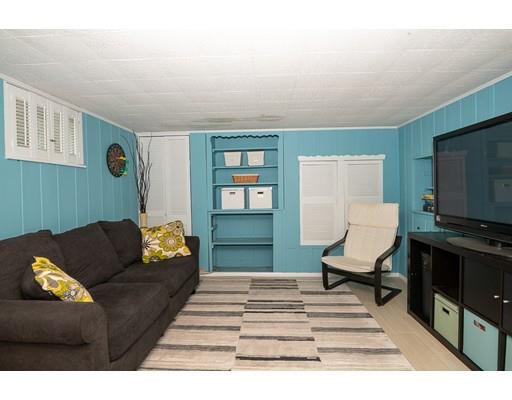 18 Austin Road Sudbury, MA 01776 - Photo 25 of 38 a living room with furniture and a flat screen tv