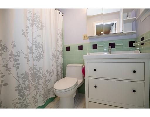 18 Austin Road Sudbury, MA 01776 - Photo 28 of 38 a bathroom with a sink a toilet and shower