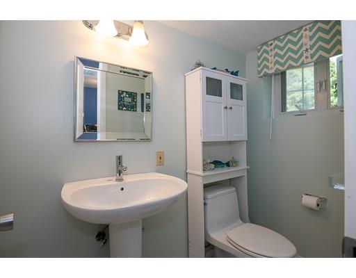 18 Austin Road Sudbury, MA 01776 - Photo 29 of 38 a bathroom with a sink a toilet and mirror