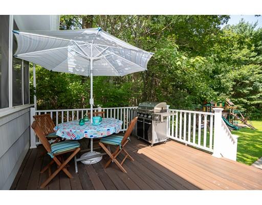 18 Austin Road Sudbury, MA 01776 - Photo 32 of 38 a view of a wooden deck with furniture