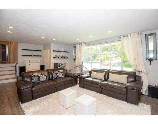 18 Austin Road Sudbury, MA 01776 - Photo 6 of 38 a living room with furniture and a large window