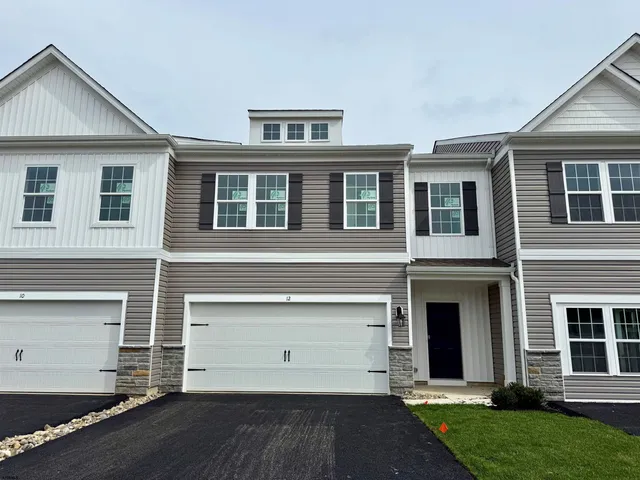 a front view of house with yard