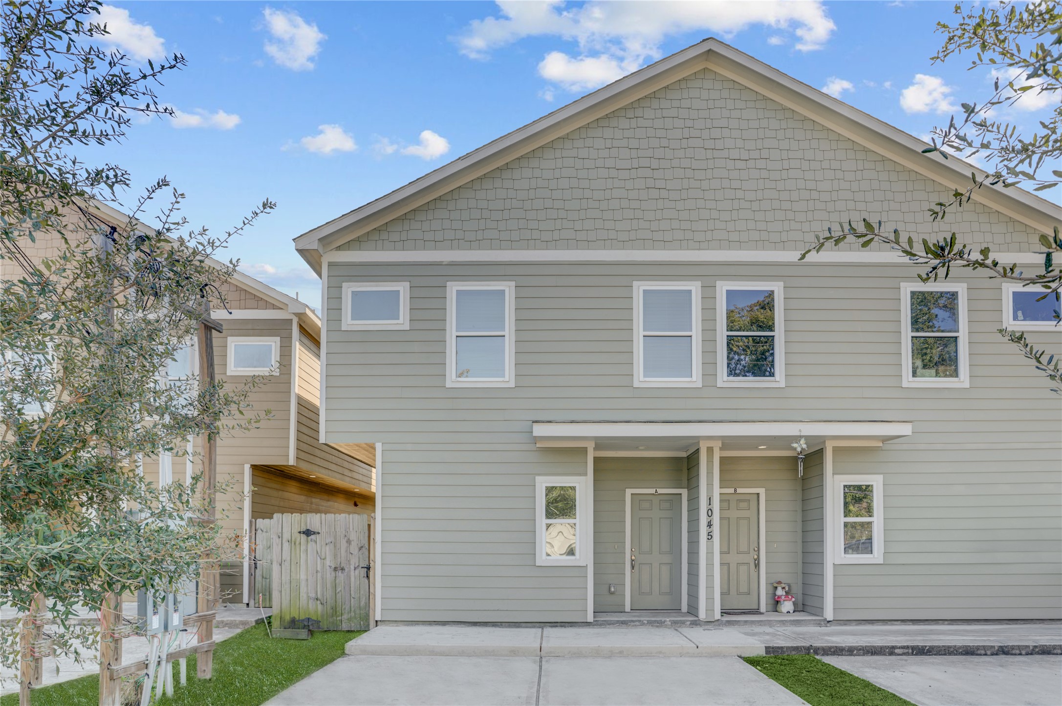 1045 Marcolin Street Houston, TX 77088 - Photo 16 of 16 a front view of a house with garden