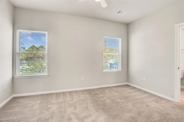 an empty room with windows