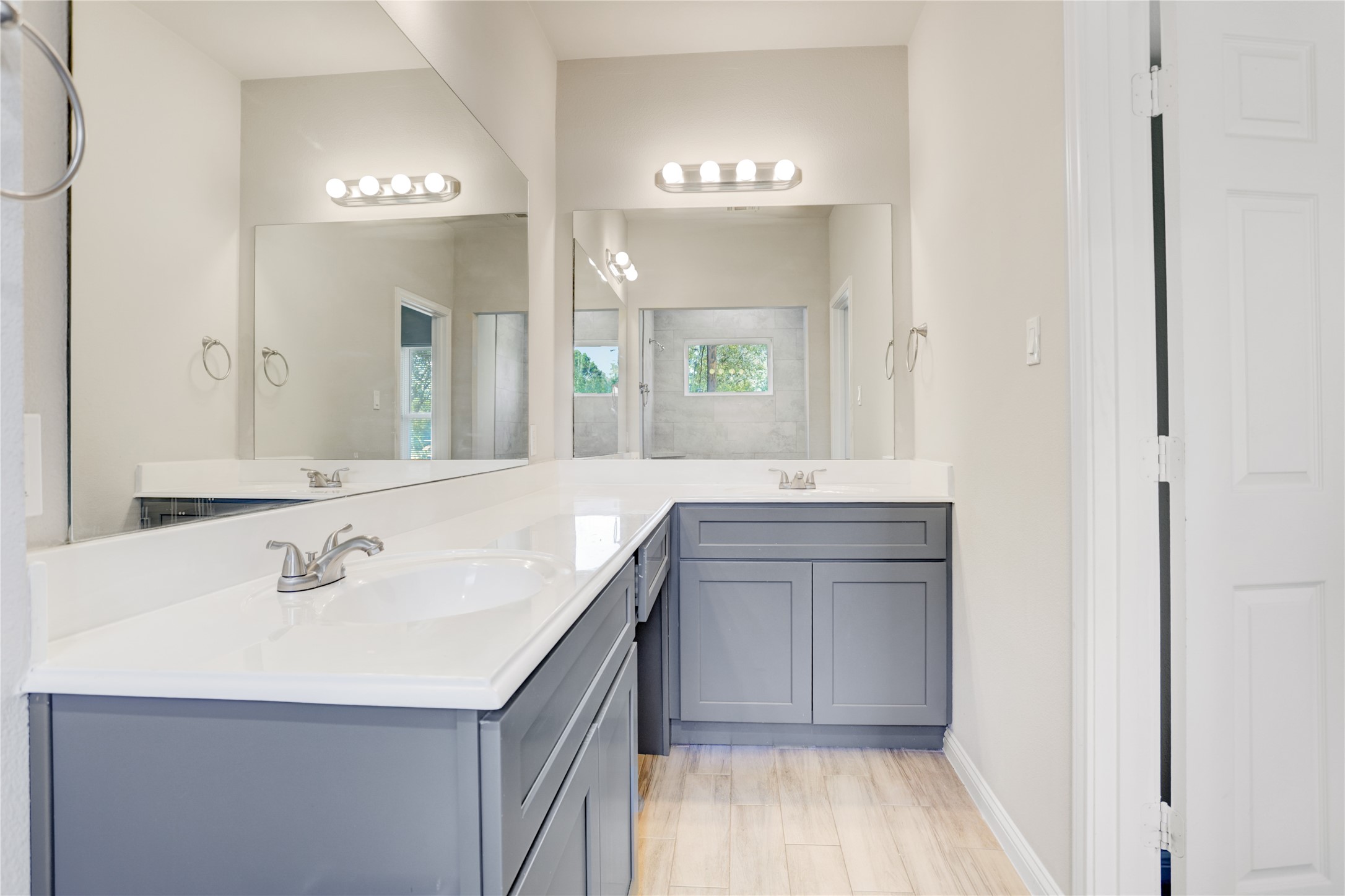 1045 Marcolin Street Houston, TX 77088 - Photo 9 of 16 a bathroom with a sink vanity and a mirror
