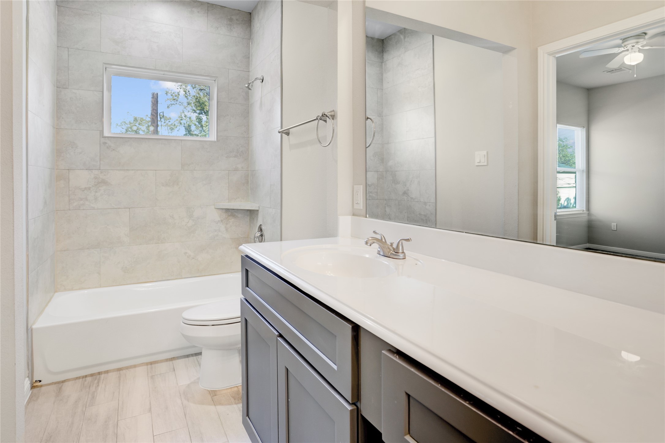 1045 Marcolin Street Houston, TX 77088 - Photo 10 of 16 a bathroom with a sink a toilet and shower