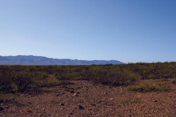 a view of an outdoor space and mountain view