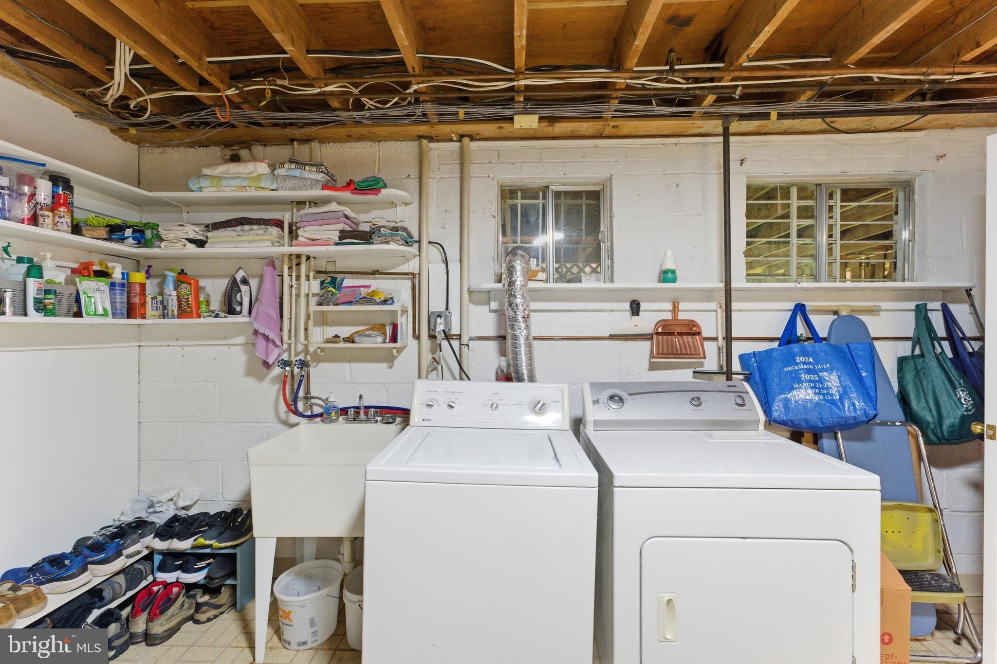 2100 Edgewater Parkway Silver Spring, MD 20903 - Photo 41 of 46 a utility room with dryer and washer
