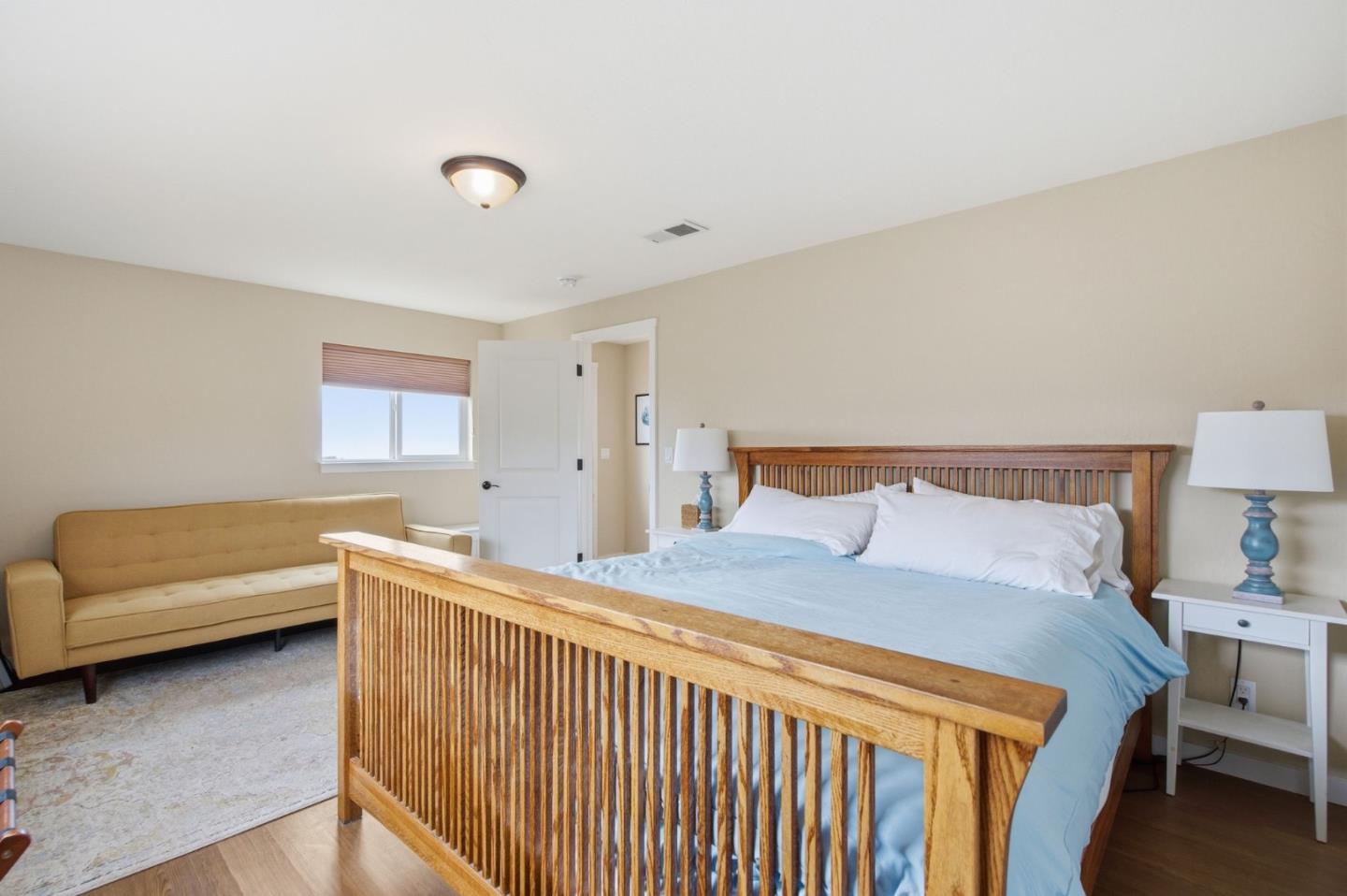 1263 Reservoir Road Pescadero, CA 94060 - Photo 58 of 66 a bedroom with a bed and a couch