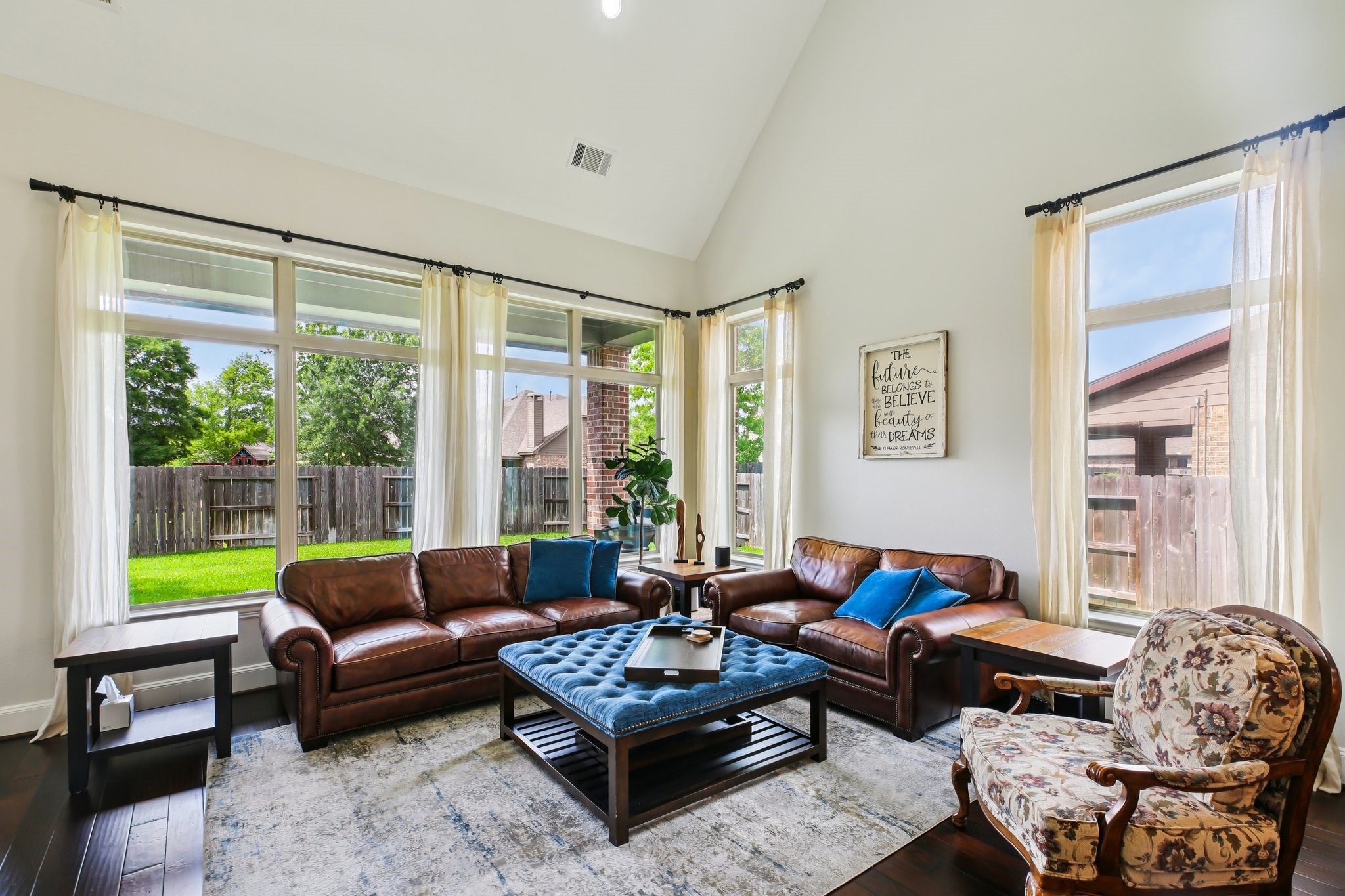 27914 Arden Trail Spring, TX 77386 - Photo 3 of 49 This spacious living room features high ceilings and large windows that flood the space with natural light.