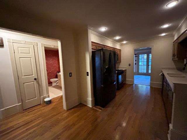 5417 Trentham Drive Atlanta, GA 30338 - Photo 13 of 18 a view of a livingroom with wooden floor and a flat screen tv