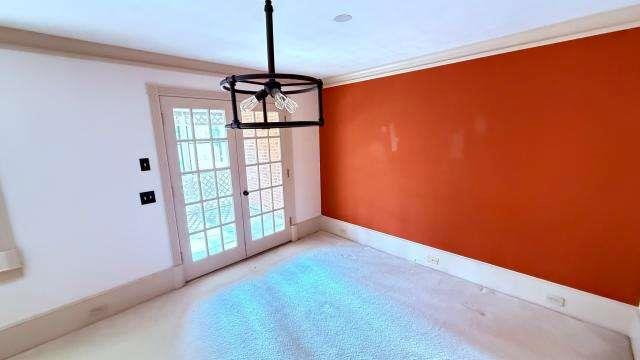 5417 Trentham Drive Atlanta, GA 30338 - Photo 6 of 18 a view of empty room with windows and ceiling fan