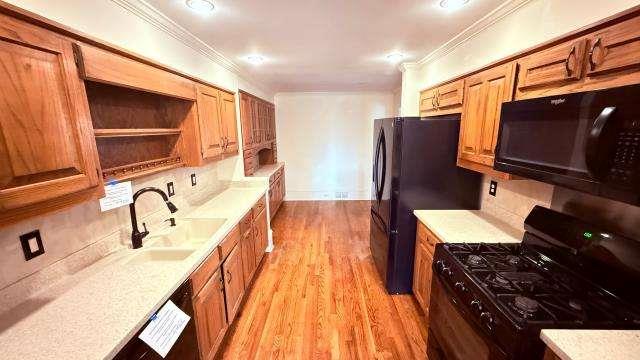 5417 Trentham Drive Atlanta, GA 30338 - Photo 7 of 18 a bathroom with a sink a mirror and bathtub