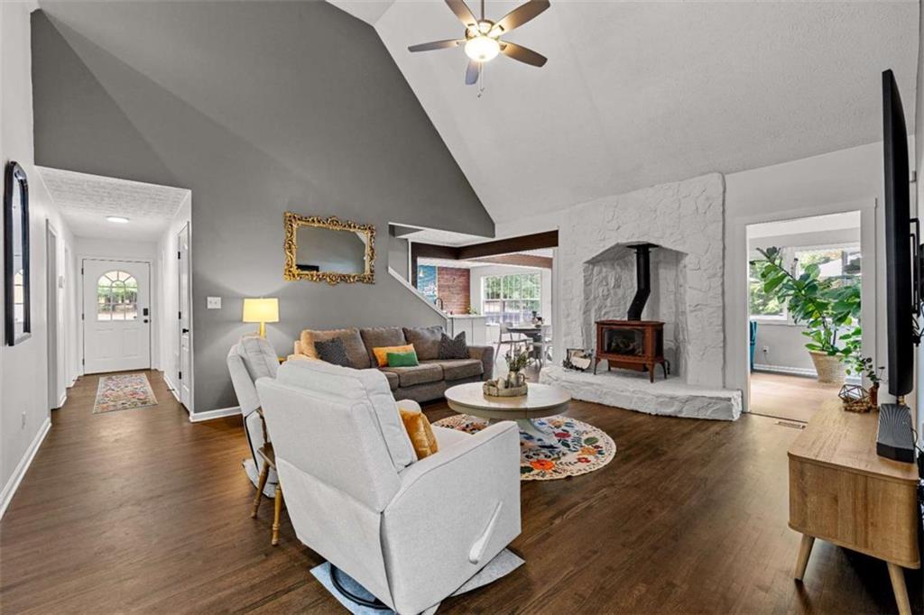 128 Byrom Road Senoia, GA 30276 - Photo 11 of 83 a living room with furniture and a fireplace