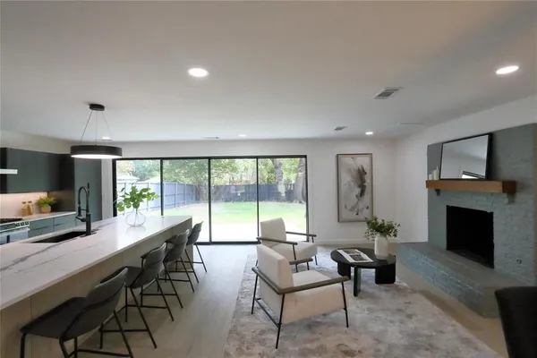 a view of a livingroom with furniture window and outside view