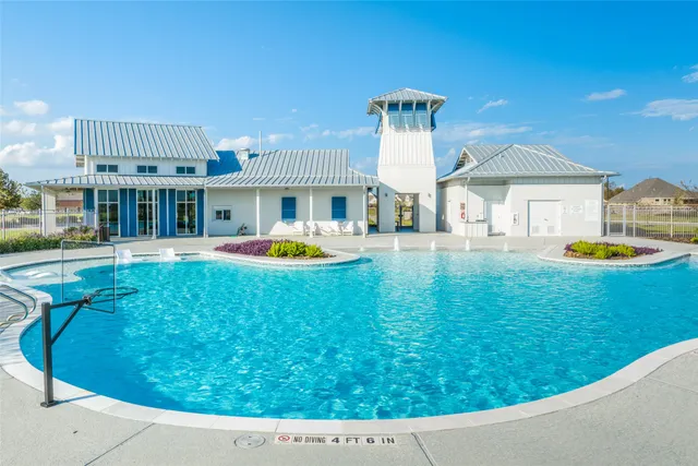 a view of a house with a swimming pool