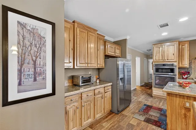 a kitchen with lots of counter top space and a sink