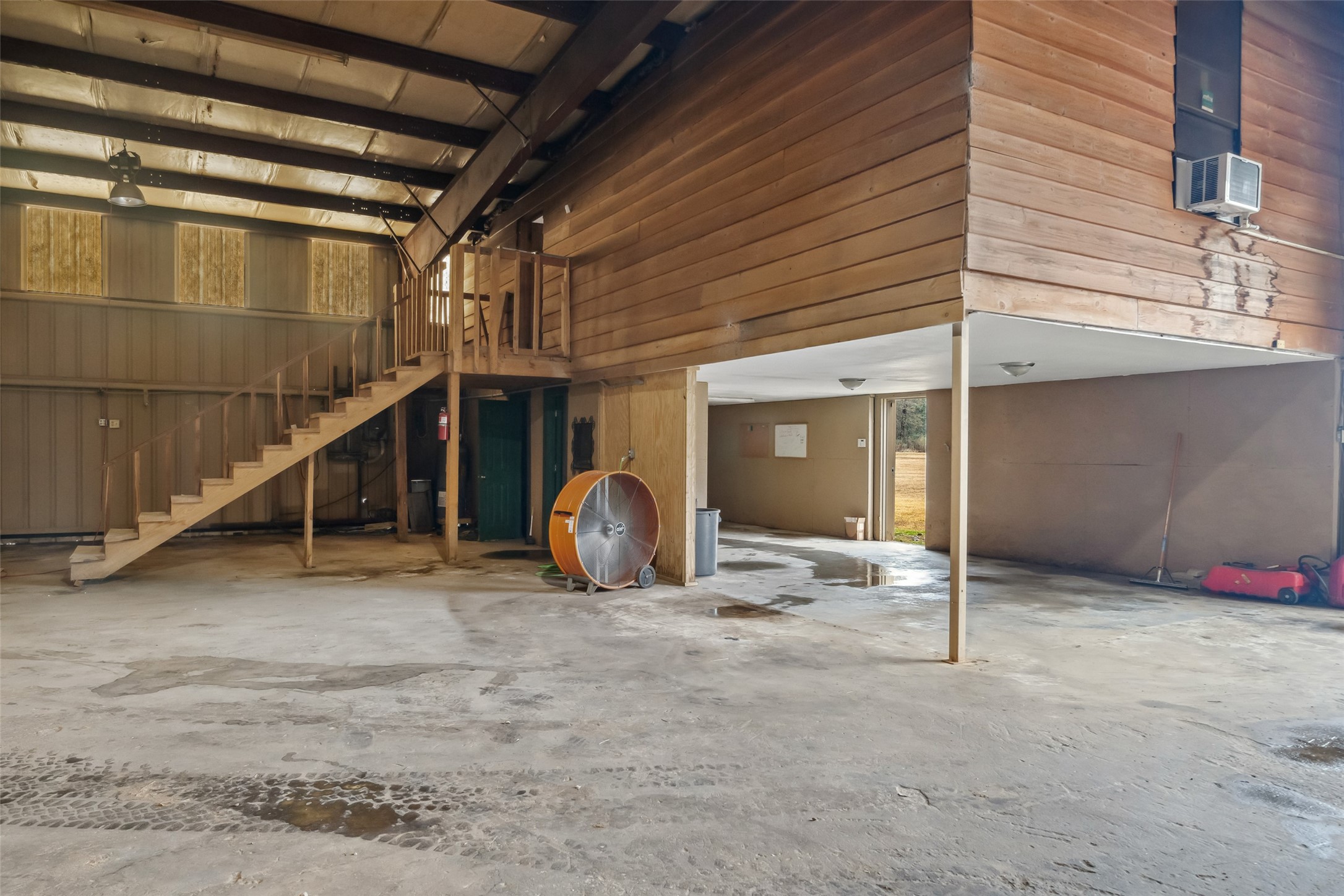 21405 Farm To Market 787 Cleveland, TX 77327 - Photo 7 of 24 The second story office/ storage area. All the wood was made from the old sawmill.