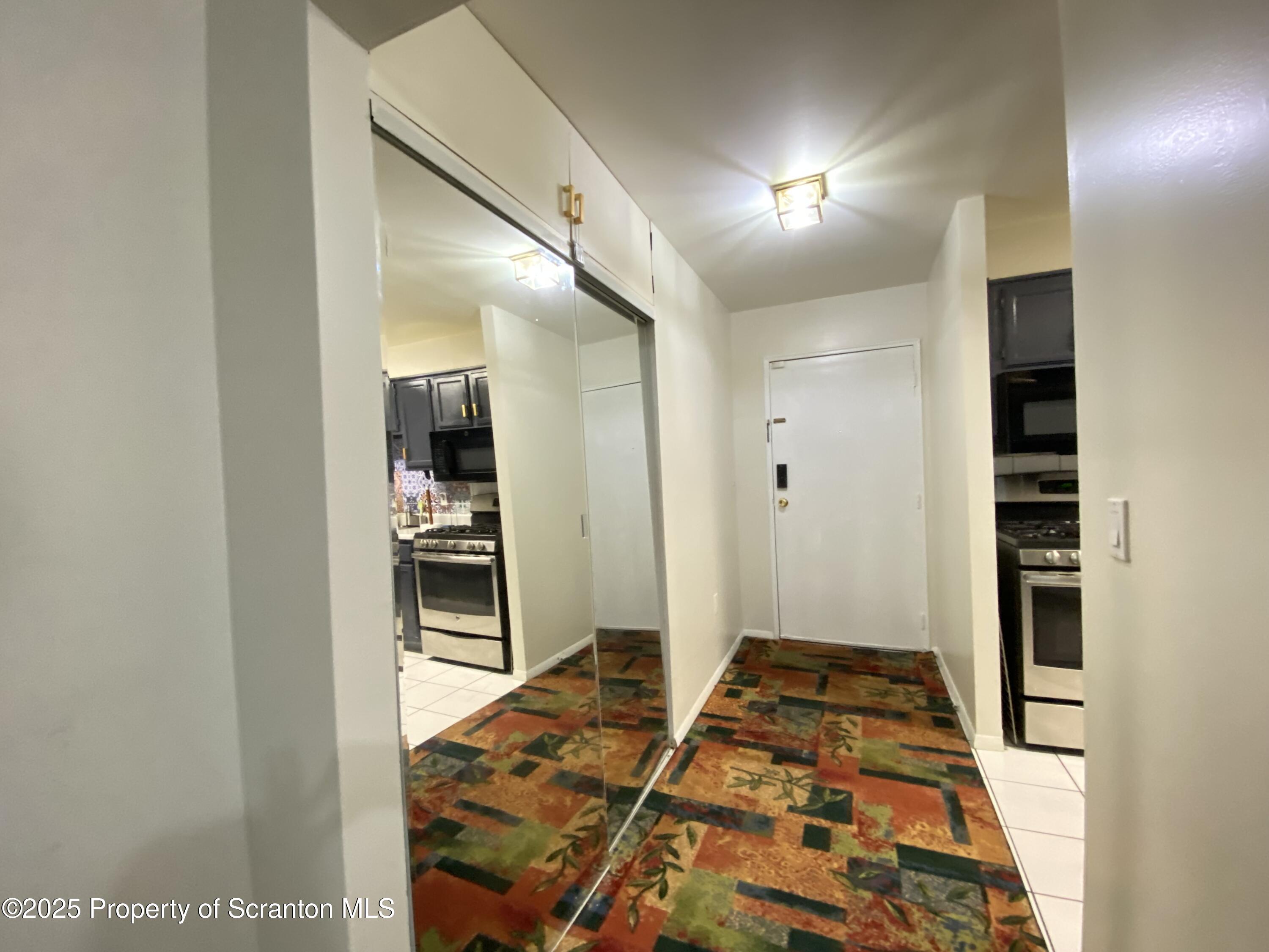 1501 Summit Pointe Scranton, PA 18508 - Photo 4 of 34 a bedroom with a bed and a view of bathroom