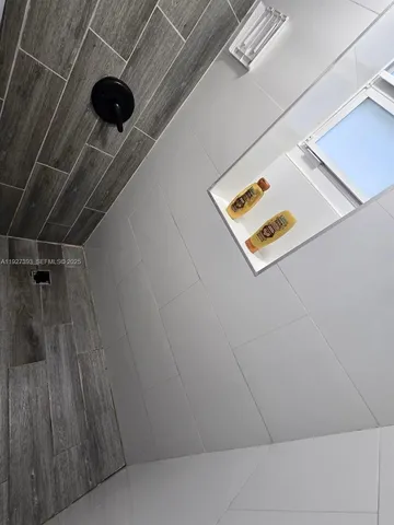 a view of a refrigerator in a kitchen