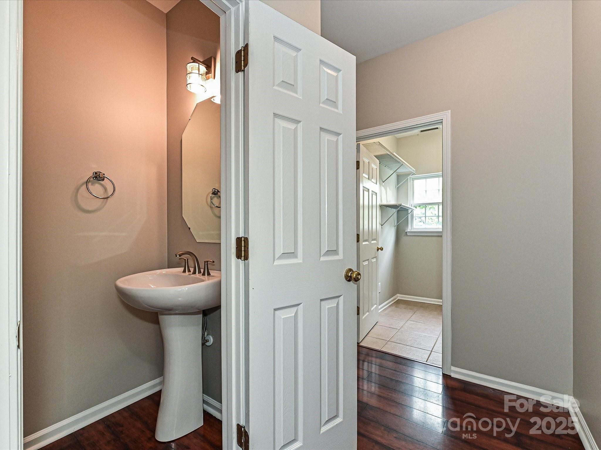 13237 Fremington Road Huntersville, NC 28078 - Photo 20 of 36 a bathroom with a sink a toilet and shower