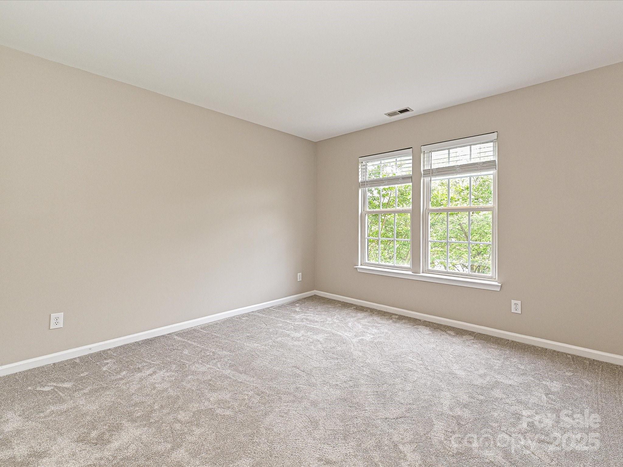 13237 Fremington Road Huntersville, NC 28078 - Photo 26 of 36 an empty room with a window