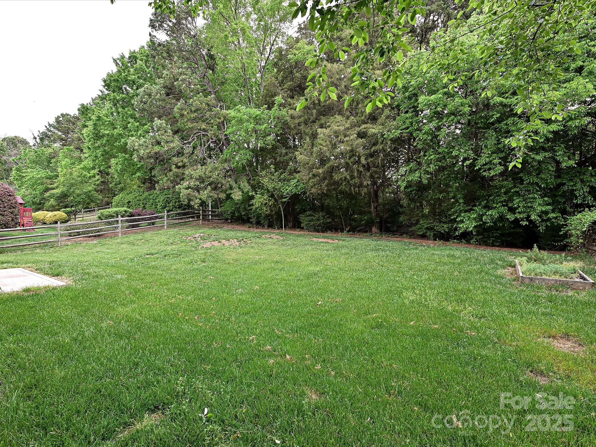 13237 Fremington Road Huntersville, NC 28078 - Photo 30 of 36 a view of outdoor space with deck and yard