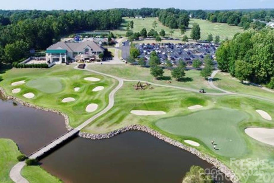 13237 Fremington Road Huntersville, NC 28078 - Photo 34 of 36 a view of a golf course with swimming pool