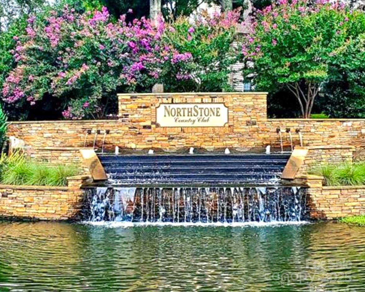13237 Fremington Road Huntersville, NC 28078 - Photo 35 of 36 a view of a swimming pool with a bench