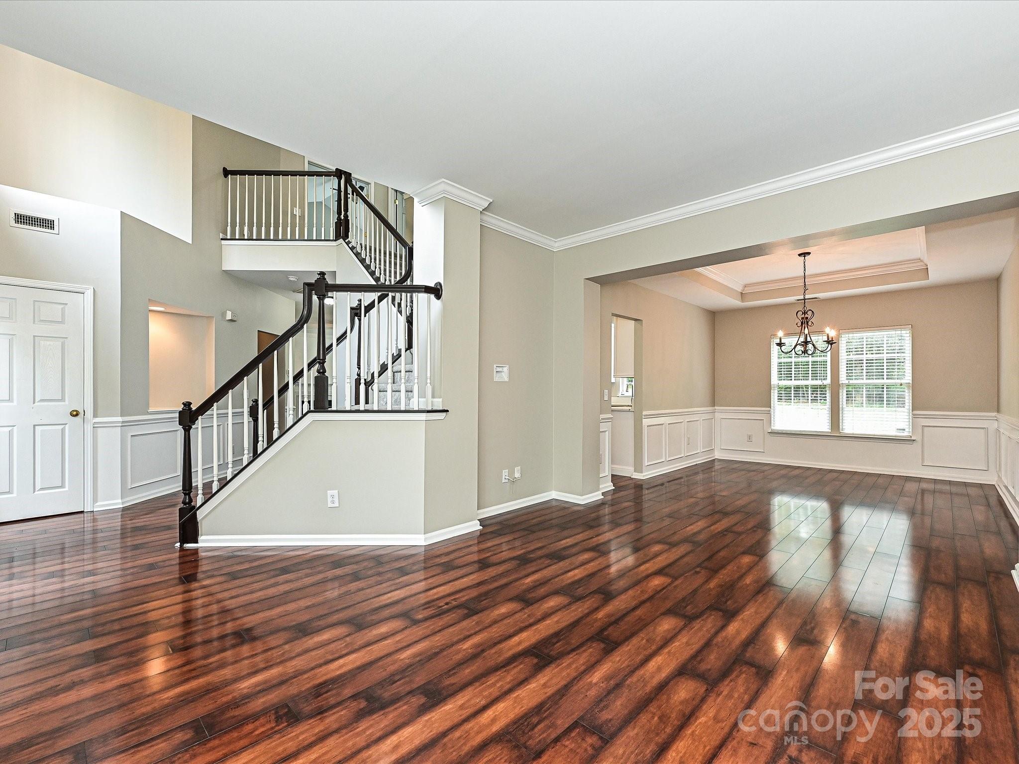 13237 Fremington Road Huntersville, NC 28078 - Photo 9 of 36 a view of entryway and hall with wooden floor