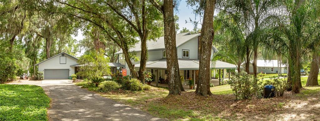 31404 Reed Road Dade City, FL 33523 - Photo 1 of 1 a front view of a house with a yard