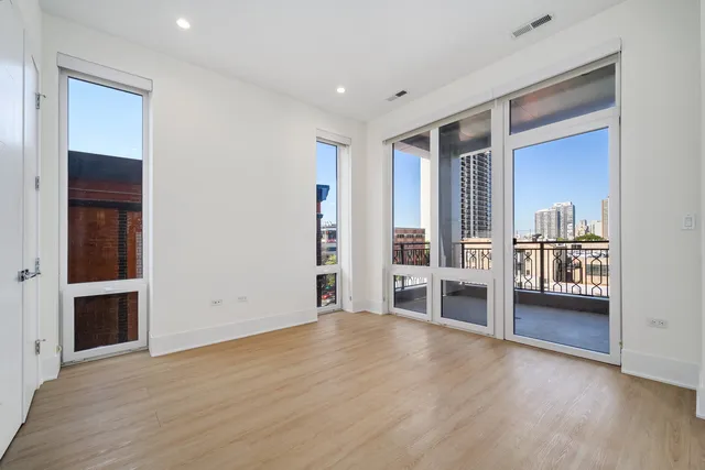 a bathroom with a sink toilet and vanity
