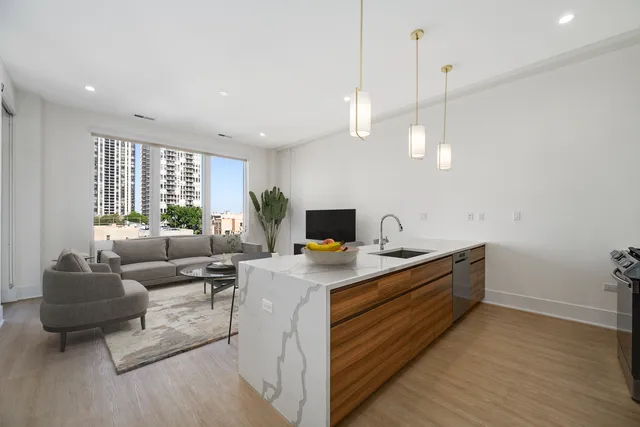 a view of a room with gym equipment and windows