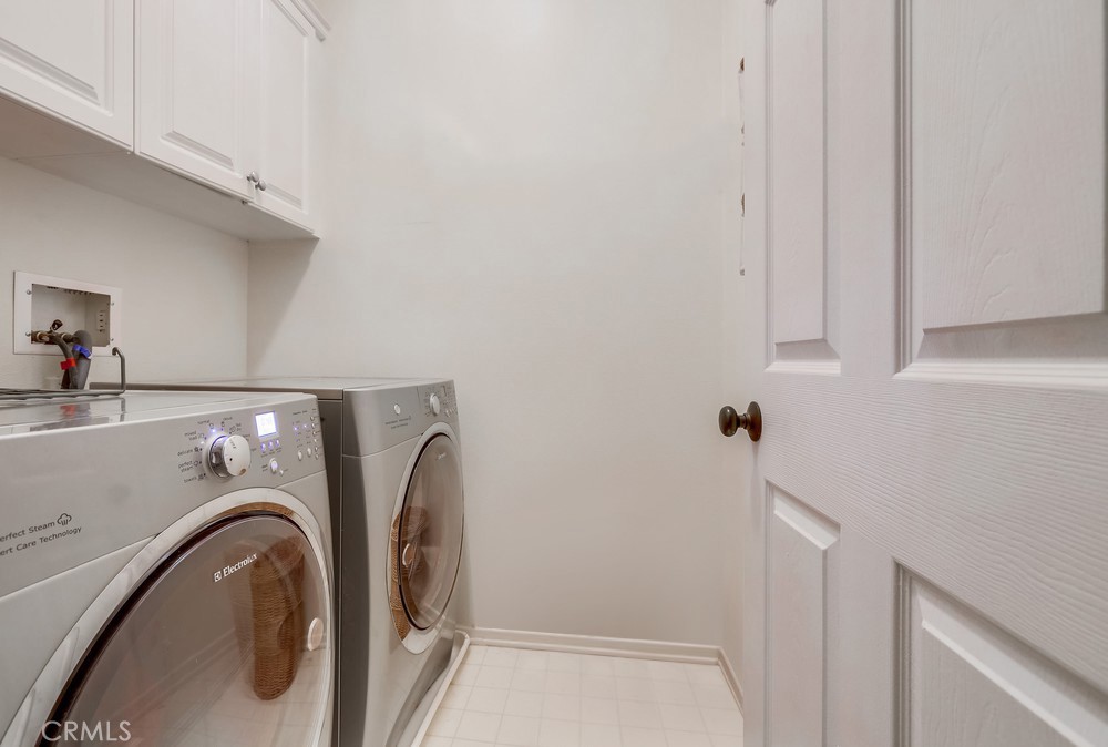 10 Paseo Rosa San Clemente, CA 92673 - Photo 9 of 24 a utility room with dryer and washer