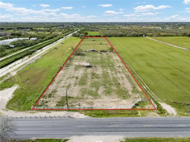 a view of swimming pool with a balcony