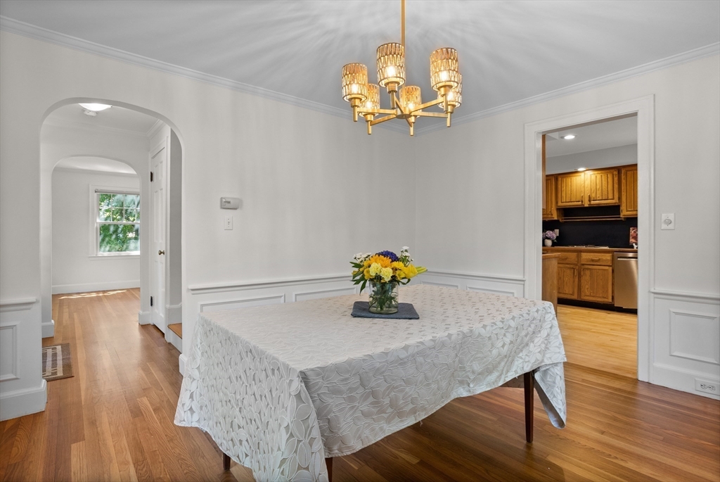38 Wachusett Drive Lexington, MA 02421 - Photo 11 of 30 a view of a dining room with furniture and wooden floor