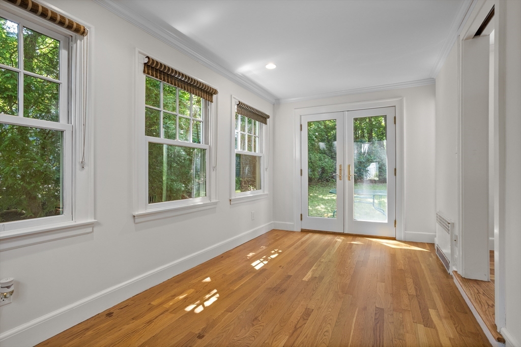 38 Wachusett Drive Lexington, MA 02421 - Photo 7 of 30 a view of empty room with wooden floor and fan