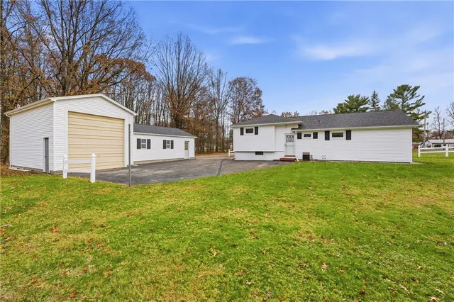 a house view with garden space