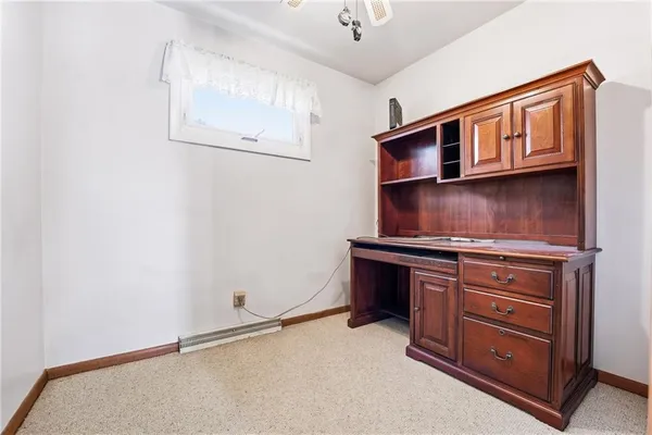 a room with cabinets and window
