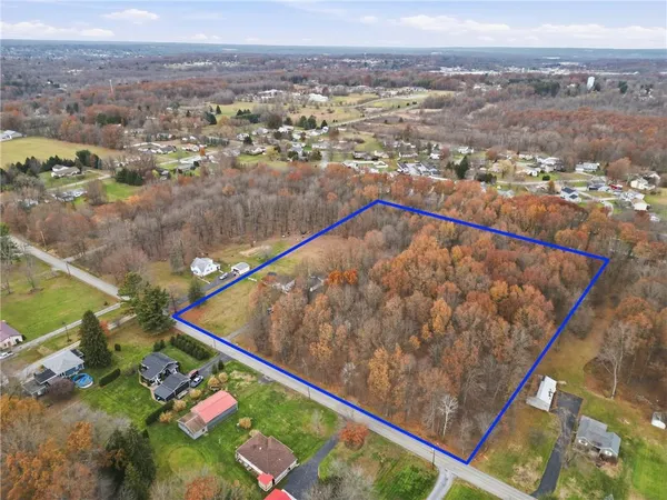 a view of a swimming pool with a terrace