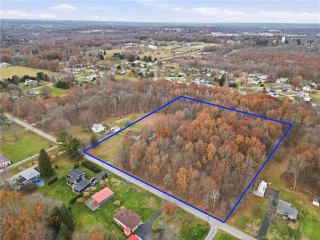 a view of a swimming pool with a terrace