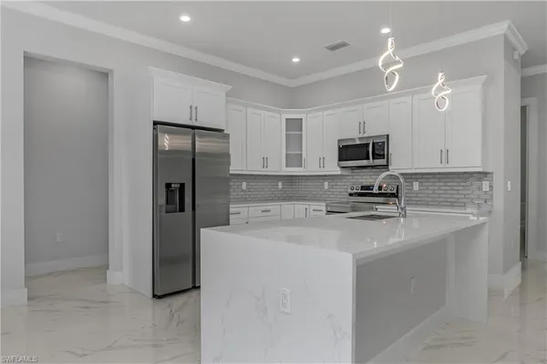 $795,000 | 791 14th Street Northeast, Naples, FL 34120