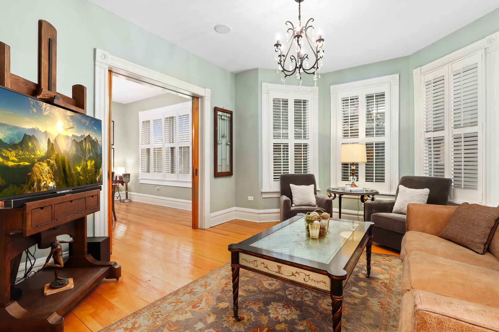 4232 North Tripp Avenue Chicago, IL 60641 - Photo 12 of 46 a living room with fireplace furniture and a flat screen tv