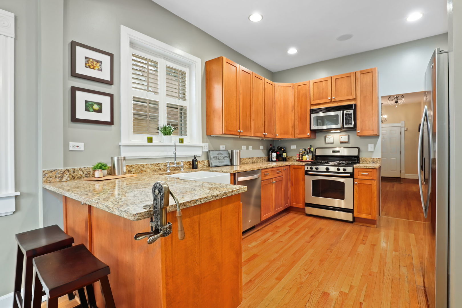 4232 North Tripp Avenue Chicago, IL 60641 - Photo 15 of 46 a kitchen with a sink appliances cabinets and a kitchen counter top space